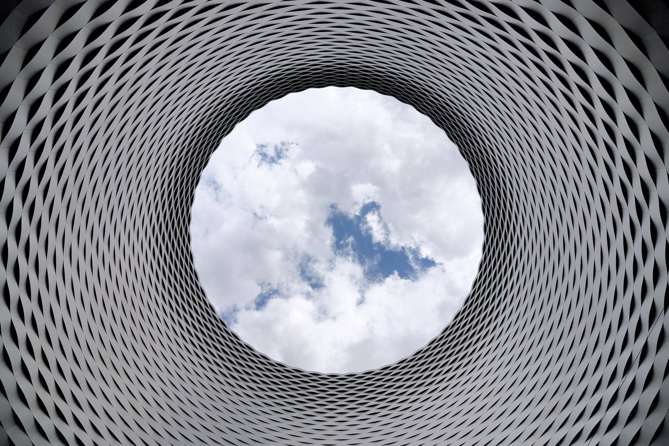 structure with clouds in centre